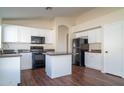 Bright kitchen, granite countertops, and white cabinets at 5730 E Holmes Ave, Mesa, AZ 85206