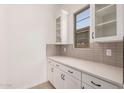 Spacious walk-in pantry with ample shelving, providing plenty of storage at 12007 W Parkway Ln, Avondale, AZ 85323