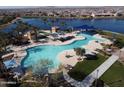 Aerial view of community pool, bocce ball, and lake at 16781 S 181St Ln, Goodyear, AZ 85338