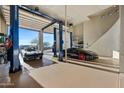 Spacious garage with car lifts and room for multiple vehicles at 12913 N 119Th St, Scottsdale, AZ 85259