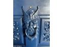 Close-up of ornately carved dark blue front door at 501 W Jasper Dr, Chandler, AZ 85225