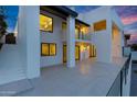 Expansive outdoor patio showcasing the home's modern architecture, with staircase and outdoor access at 5439 S Lighthouse Ln, Tempe, AZ 85283