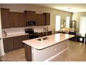 Spacious kitchen with island and ample cabinet space at 1255 N Arizona Ave # 1099, Chandler, AZ 85225