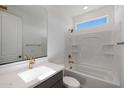 Clean bathroom featuring a tub, shower, and a modern vanity with gold fixtures at 4106 W Eli Dr, San Tan Valley, AZ 85144