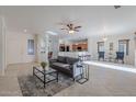 Open living room showcasing kitchen and dining area views at 19661 N Echo Rim Dr, Surprise, AZ 85387