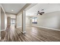 Spacious dining room with hardwood floors and modern chandelier at 41432 N Bent Creek Way, Phoenix, AZ 85086