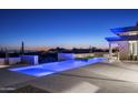 Night view of resort style pool and spa at 28805 N 114Th St, Scottsdale, AZ 85262