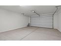 Clean, spacious two-car garage with ample room for vehicles and storage at 18186 W Pima St, Goodyear, AZ 85338