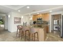 Modern kitchen with island and stainless steel appliances at 7117 E Rancho Vista Dr # 4006, Scottsdale, AZ 85251
