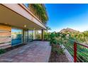 Private patio with mountain views and tiled flooring at 7117 E Rancho Vista Dr # 4006, Scottsdale, AZ 85251