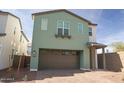 Charming two-story home featuring a 2-car garage and a welcoming covered porch at 2428 W Rowel Rd, Phoenix, AZ 85085
