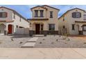 New construction home features a private front entrance and low maintenance desert landscaping at 15598 S 181St Dr, Goodyear, AZ 85338