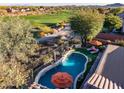 Stunning pool and backyard with golf course views at 40903 N Harbour Town Way, Anthem, AZ 85086