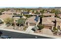 A bird's eye view reveals solar panels atop a well-maintained, single-Gathering house at 12364 W Rosewood Ln, Peoria, AZ 85383