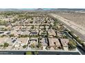 Extensive neighborhood featuring homes with tile roofs, interspersed by desert landscaping at 12364 W Rosewood Ln, Peoria, AZ 85383