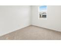 Cozy bedroom featuring neutral carpet and a window at 3337 E Alexander Dr, San Tan Valley, AZ 85143