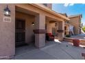 Quaint front porch with seating and decorative accents at 4321 E Morenci Rd, San Tan Valley, AZ 85143