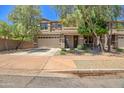 Inviting two-story home with a manicured front yard, neutral color scheme, and ample parking at 35202 N 30Th Dr, Phoenix, AZ 85086