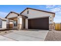 Attractive single-Gathering home with a spacious driveway and neutral color palette at 16625 N Lunar St, Maricopa, AZ 85138