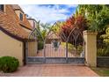 Ornate iron gate leading to the property's entrance at 363 E Monte Vista Rd, Phoenix, AZ 85004