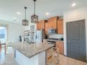 Modern kitchen featuring granite countertops and stainless steel appliances at 3559 E Archer Dr, San Tan Valley, AZ 85140