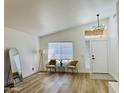 Bright living room features modern furnishings, neutral decor, and lots of natural light at 5984 W Geronimo Ct, Chandler, AZ 85226