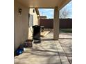 Relaxing covered patio area extends the living space outdoors, ideal for entertaining or quiet enjoyment at 12009 W Aster Dr, El Mirage, AZ 85335