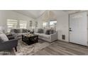 Comfortable living room with neutral tones, modern furnishings, and bright natural lighting at 2233 E Behrend Dr # 210, Phoenix, AZ 85024