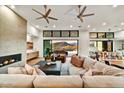 Open living space showcasing a cozy sectional sofa and mountain views at 9930 E Miramonte Dr, Scottsdale, AZ 85262