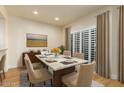 Elegant dining room with a large table and neutral decor at 21320 N 56Th St # 2159, Phoenix, AZ 85054