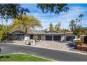 Luxury home with expansive driveway and beautifully landscaped grounds at 5919 N 45Th St, Phoenix, AZ 85018