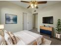 Inviting bedroom with a plush bed, modern decor, and a stylish dresser, creating a relaxing retreat at 1446 S Revere --, Mesa, AZ 85210