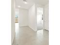 Bright hallway with tile flooring leading to other rooms at 4256 W Jeanette Ln, San Tan Valley, AZ 85144