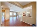 Spacious living area with hardwood floors and open floor plan at 19403 N Ponderosa Ct, Surprise, AZ 85387