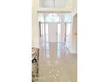 Bright and airy entryway with tile flooring and lots of natural light at 8053 E Natal Ave, Mesa, AZ 85209