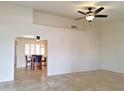 Spacious living room with tile flooring and ceiling fan at 8203 E Nopal Ave, Mesa, AZ 85209