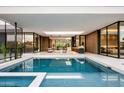 Breathtaking pool and patio area offering multiple spaces and stunning views into the home at 6623 N Hillside Dr, Paradise Valley, AZ 85253