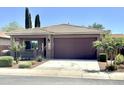 Single-story home featuring desert landscaping, a two-car garage, and a covered front porch at 901 W Witt Ave, Queen Creek, AZ 85140