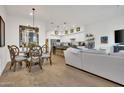 Modern kitchen with white cabinets, gray countertops, and stainless steel appliances at 5151 N 13Th Pl # 4, Phoenix, AZ 85014