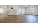 Open concept dining area with hardwood floors and access to kitchen at 718 E Scorpio Pl, Chandler, AZ 85249