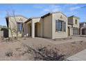 Two-story home with a front yard and landscaping at 2134 W Rowel Rd, Phoenix, AZ 85085
