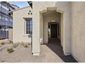 Covered entryway with arched walkway and tile flooring at 2134 W Rowel Rd, Phoenix, AZ 85085