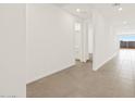 Bright hallway with tile flooring at 36973 W La Paz St, Maricopa, AZ 85138