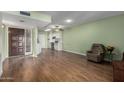 Inviting living room featuring hardwood floors and an open floor plan at 3345 E University Dr # 2, Mesa, AZ 85213
