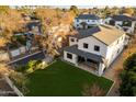 Aerial view showcasing a large backyard, home, and surrounding neighborhood at 7240 N 13Th Ln, Phoenix, AZ 85021