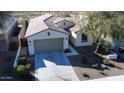 Single-story home with a two-car garage and landscaped front yard at 10637 W Eucalyptus Rd, Peoria, AZ 85383