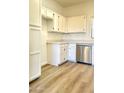 Well-lit kitchen showcasing ample cabinet space and stainless steel appliances at 19400 N Westbrook Pkwy # 311, Peoria, AZ 85382