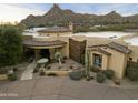 Elegant home with circular drive and landscaping at 27264 N 103Rd Way, Scottsdale, AZ 85262