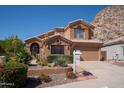 Charming two-story home featuring low maintenance desert landscaping at 1416 E Sapium Way, Phoenix, AZ 85048