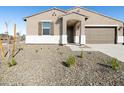Well-maintained front yard with desert landscaping and a clean, modern design at 16082 W Desert Spoon Dr, Surprise, AZ 85387